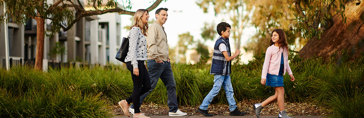 Family walking through Lyndarum North community by AVJennings, located in Wollert VIC 3750. Land for sale in Wollert, townhomes for sale in Wollert. 